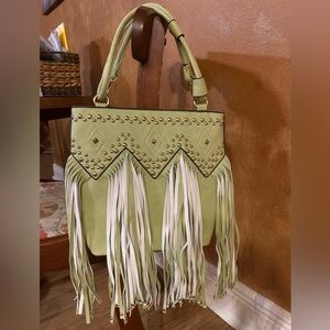Fringe and silver studded embellished leather handbag
